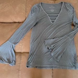 Flared long sleeved top